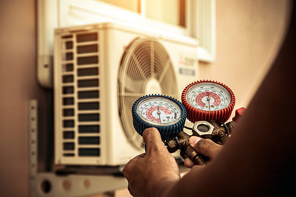 Professional Heat Pump Repair technician working in Salem, WI